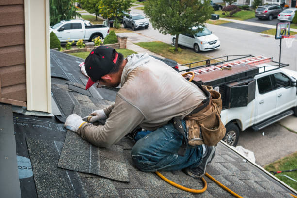 Professional Roofing technician working in Woodside, DE